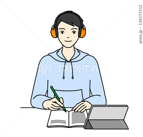 聴覚過敏用イヤーマフで周囲の音を遮断し勉強する男子高校生 136372312