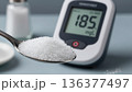 Excessive Sugar Intake with High Blood Sugar Monitor Diabetes Risk Concept 136377497