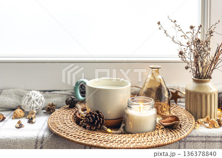Cozy home composition with coffee cup and home decor details. 136378840