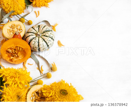 Autumn flat lay background with pumpkins and flowers, copy space. 136378942