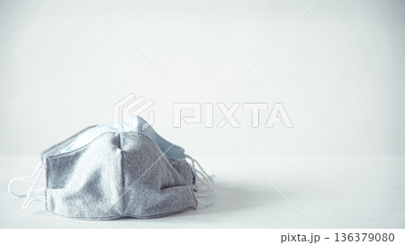 Handmade face protective masks on white background copy space. Handmade face protective masks on white background copy space. 136379080