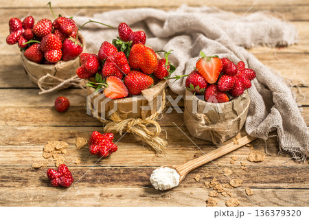 arrangement with fresh strawberries on wooden background arrangement with fresh strawberries on wooden background 136379320