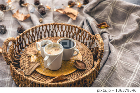 Autumn composition with cups of coffee and leaves. Autumn composition with cups of coffee and leaves. 136379346