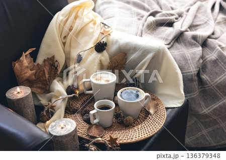 Autumn composition with cups of coffee and leaves. Autumn composition with cups of coffee and leaves. 136379348