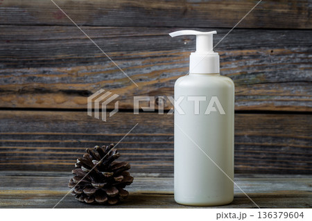 capacity for cosmetic, wooden background 136379604