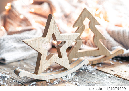 Close-up, Christmas wooden decorative figurines on a blurred background. 136379669