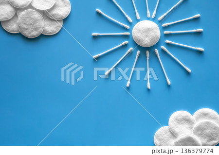 Clouds and sun made of cotton swabs and cotton discs. 136379774