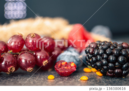 Natural background with different wild berries, macro shot. 136380616