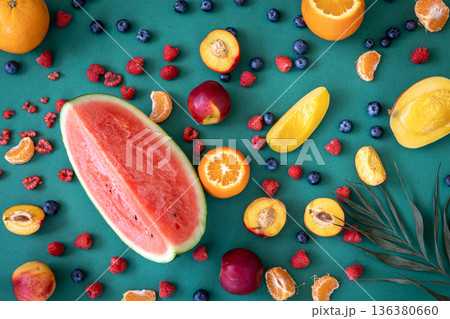 Tropical fruits on a blue background, flat lay. Tropical fruits on a blue background, flat lay. 136380660