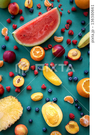 Tropical fruits on a blue background, flat lay. Tropical fruits on a blue background, flat lay. 136380661