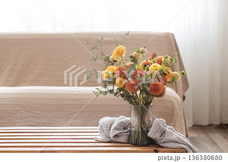 Bouquet of chrysanthemums in a vase in the interior of the room, copy space. Bouquet of chrysanthemums in a vase in the interior of the room, copy space. 136380680