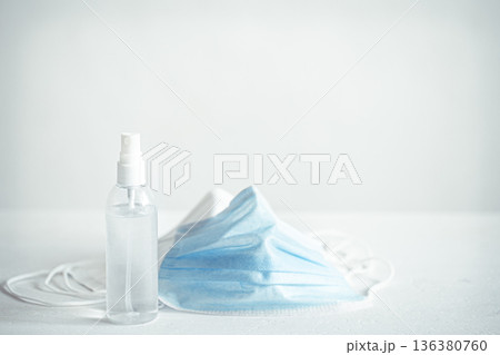 Coronavirus prevention hand sanitizer and protection face masks against coronavirus copy space. Coronavirus prevention hand sanitizer and protection face masks against coronavirus copy space. 136380760