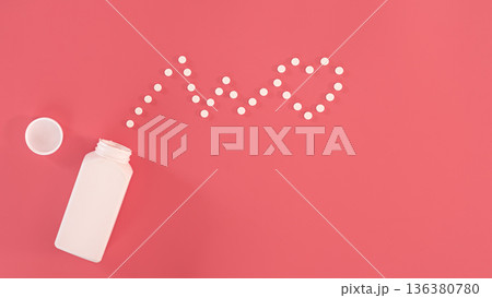 Pills on pink background, flat lay, medicine concept. Pills on pink background, flat lay, medicine concept. 136380780