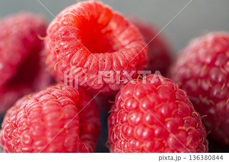 Ripe raspberries macro shot, selective focus, fruit background. Ripe raspberries macro shot, selective focus, fruit background. 136380844