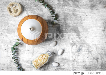 Spa composition with aroma diffuser on a textured background, flat lay. 136380959