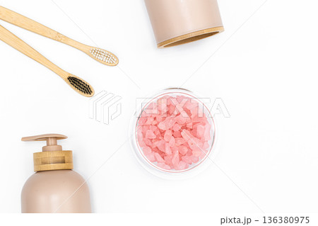 Spa composition with body care products on a white background, top view. Spa composition with body care products on a white background, top view. 136380975