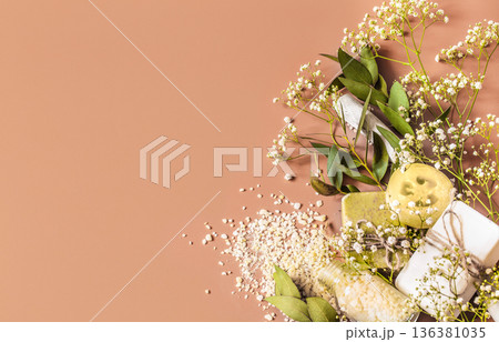 Spa concept with body and face accessories on colored background. Place for text 136381035