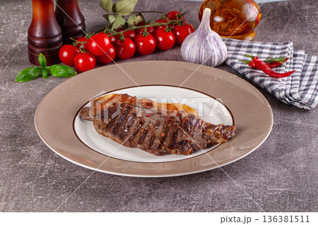 Grilled gourmet rib-eye beef steak 136381511