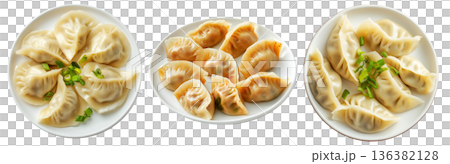 Steamed mandu dumplings placed in circular pattern on ceramic plate, isolated on white transparent background Steamed mandu dumplings placed in circular pattern on ceramic plate, isolated on white transparent background 136382128