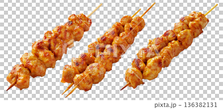 Grilled chicken Satay skewer with a golden brown glaze, isolated on white background, concept of tasty street food Grilled chicken Satay skewer with a golden brown glaze, isolated on white background, concept of tasty street food 136382131