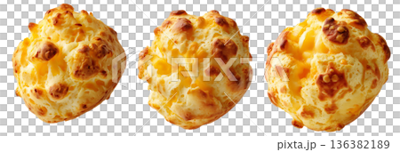 Small cheesy bread ball with golden crust and holes, isolated on white background, concept of Brazil Pao de Queijo food 136382189