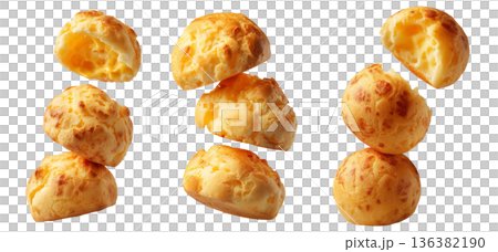 Stack of Brazilian cheesy bread balls with golden crust and holes, isolated on white background, concept of Pao de Queijo food 136382190