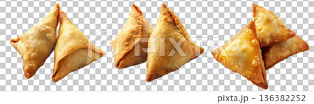 Golden brown crispy samosas isolated on white transparent background, traditional Indian snack concept 136382252