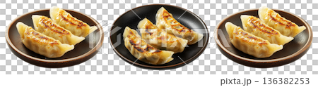 Golden pan-fried Japanese gyoza dumplings served on plate, isolated on white background, concept of Asian cuisine 136382253