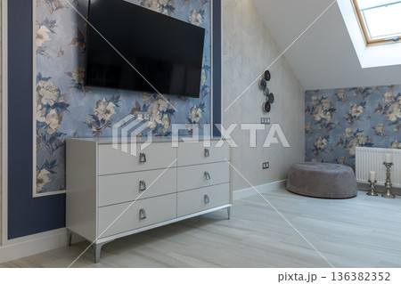 Modern Bedroom Media Area with White Dresser and Wall Mounted TV 136382352