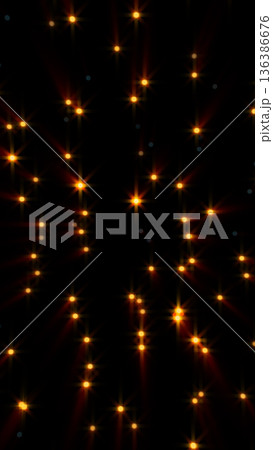 Glowing golden star-shaped lights forming a soft grid pattern on a black background Glowing golden star-shaped lights forming a soft grid pattern on a black background 136386676