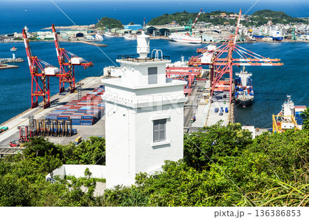 View of the Keelung Chiutzushan Lighthouse, which is the first Locally Built Lighthouse in Taiwan. With the Port of Keelung and Heping Island Park. 136386853