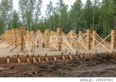 construction of a new house in the forest 136387401