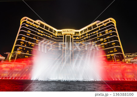 Beautiful night view of Wynn Palace Performance Lake displays a water, music, and light show, is a hotel casino resort on the Cotai Strip in Macau, China. 136388100