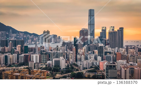 Feb 1 2026 Warm Sunset Illuminates Yau Tsim Mong Skyline And Harbour 136388370