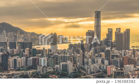 Feb 1 2026 Warm Sunset Illuminates Yau Tsim Mong Skyline And Harbour 136388382