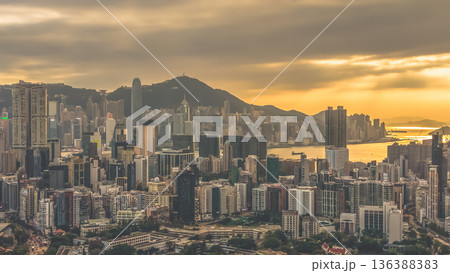 Feb 1 2026 Warm Sunset Illuminates Yau Tsim Mong Skyline And Harbour 136388383