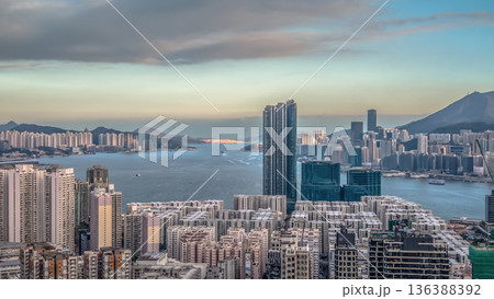 Feb 1 2026 Warm Evening Light Illuminates Hung Hom Skyline Beside Harbour Feb 1 2026 Warm Evening Light Illuminates Hung Hom Skyline Beside Harbour 136388392