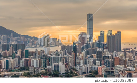 Feb 1 2026 Warm Sunset Illuminates Yau Tsim Mong Skyline And Harbour 136388397