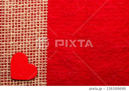 heart on red cloth background heart on red cloth background 136388690