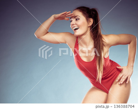 Lifeguard woman looking out into the distance. Lifeguard woman looking out into the distance. 136388704