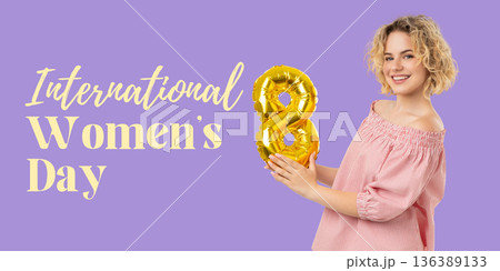 Young woman holds a golden balloon shaped like a number 8 Young woman holds a golden balloon shaped like a number 8 136389133