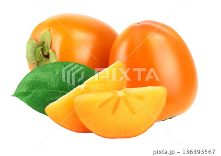 slice of Persimmon fruit with leaves isolated on white background close-up 136393567