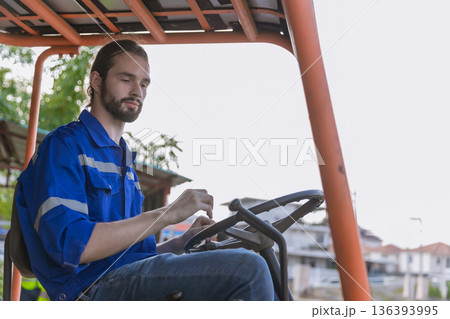 Man worker at forklift driver happy working in industry factory logistic ship. Man worker at forklift driver happy working in industry factory logistic ship. 136393995