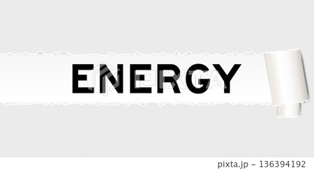 Ripped gray paper background that have word energy under torn part 136394192