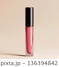 Luxury lip gloss tube on clean minimal background. Lip shine, glaze, plumper, jelly, oil. Premium decorative cosmetic, professional makeup, fashion, beauty concepts. High end product marketing visuals 136394842