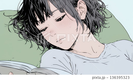 資料（本）を読みながら、うとうと眠ってしまう若い女性 136395323