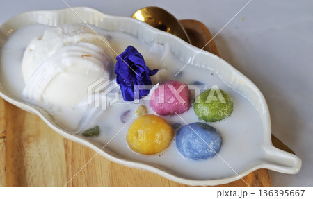 Traditional Thai dessert. Coconut ice cream served with Thai glutinous rice balls (bua loi). 136395667