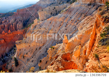 Explore the unique rock formations and slopes of Bryce Canyon in the USA during daytime Explore the unique rock formations and slopes of Bryce Canyon in the USA during daytime 136396709