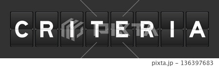 Black color analog flip board with word criteria on gray background 136397683