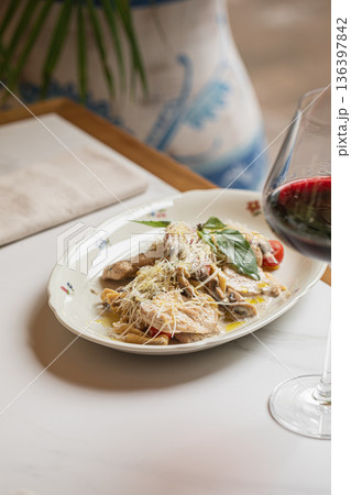 Italian chicken pasta with mushrooms and wine Italian chicken pasta with mushrooms and wine 136397842